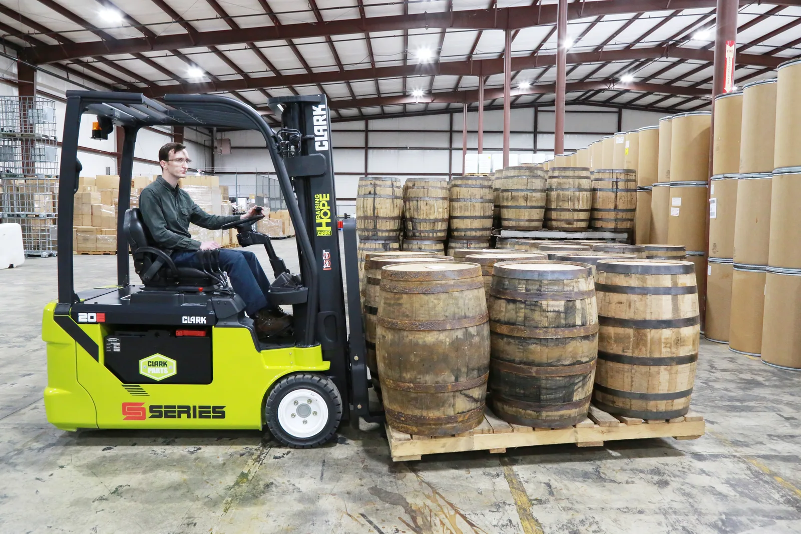 Electric counterbalance forklift working indoors