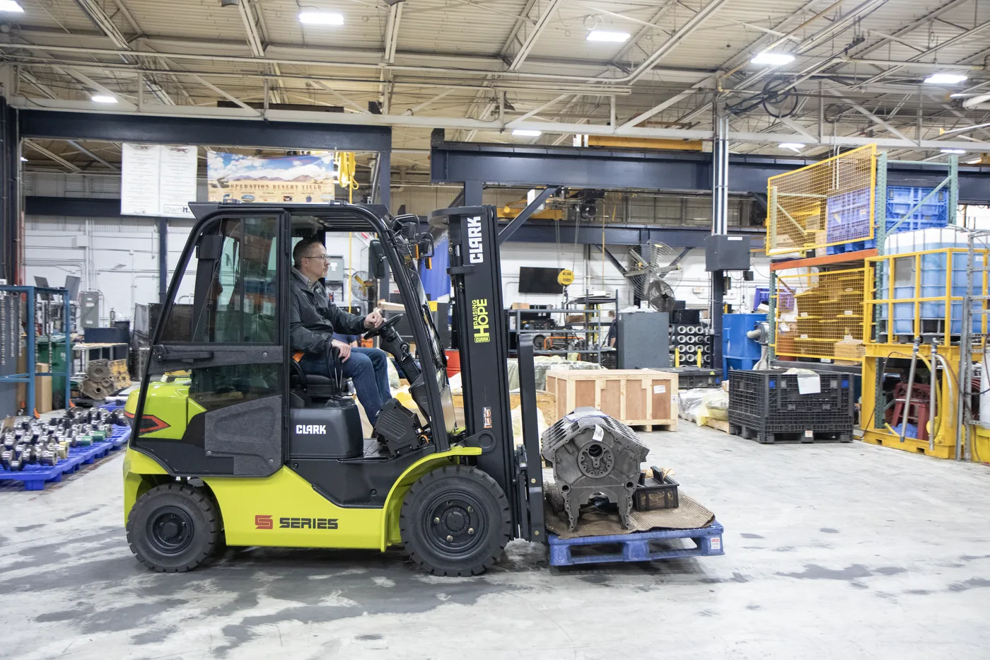 Forklift operating in a manufacturing plant